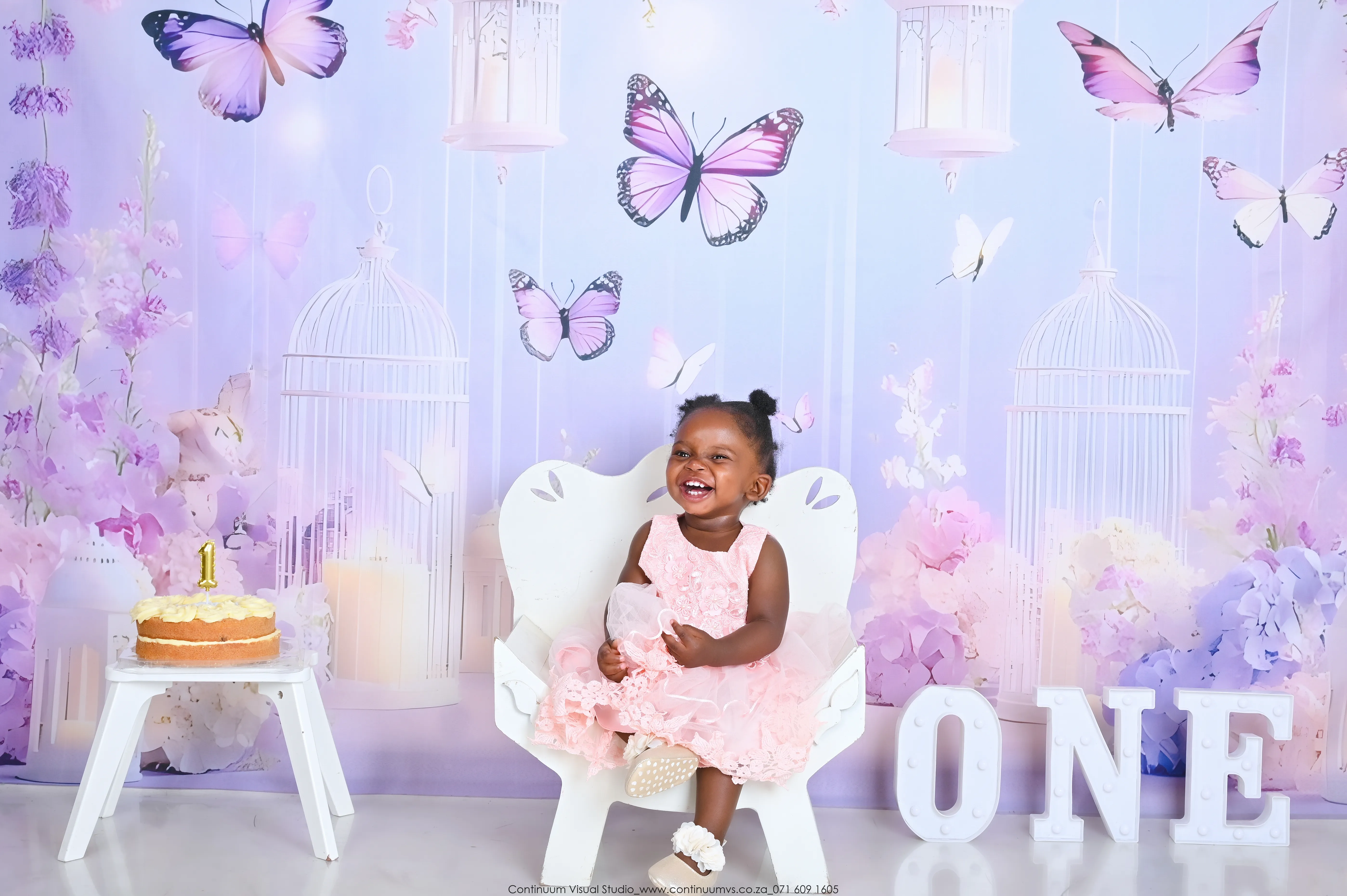 Cake smash milk bath finale — baby in floral tub