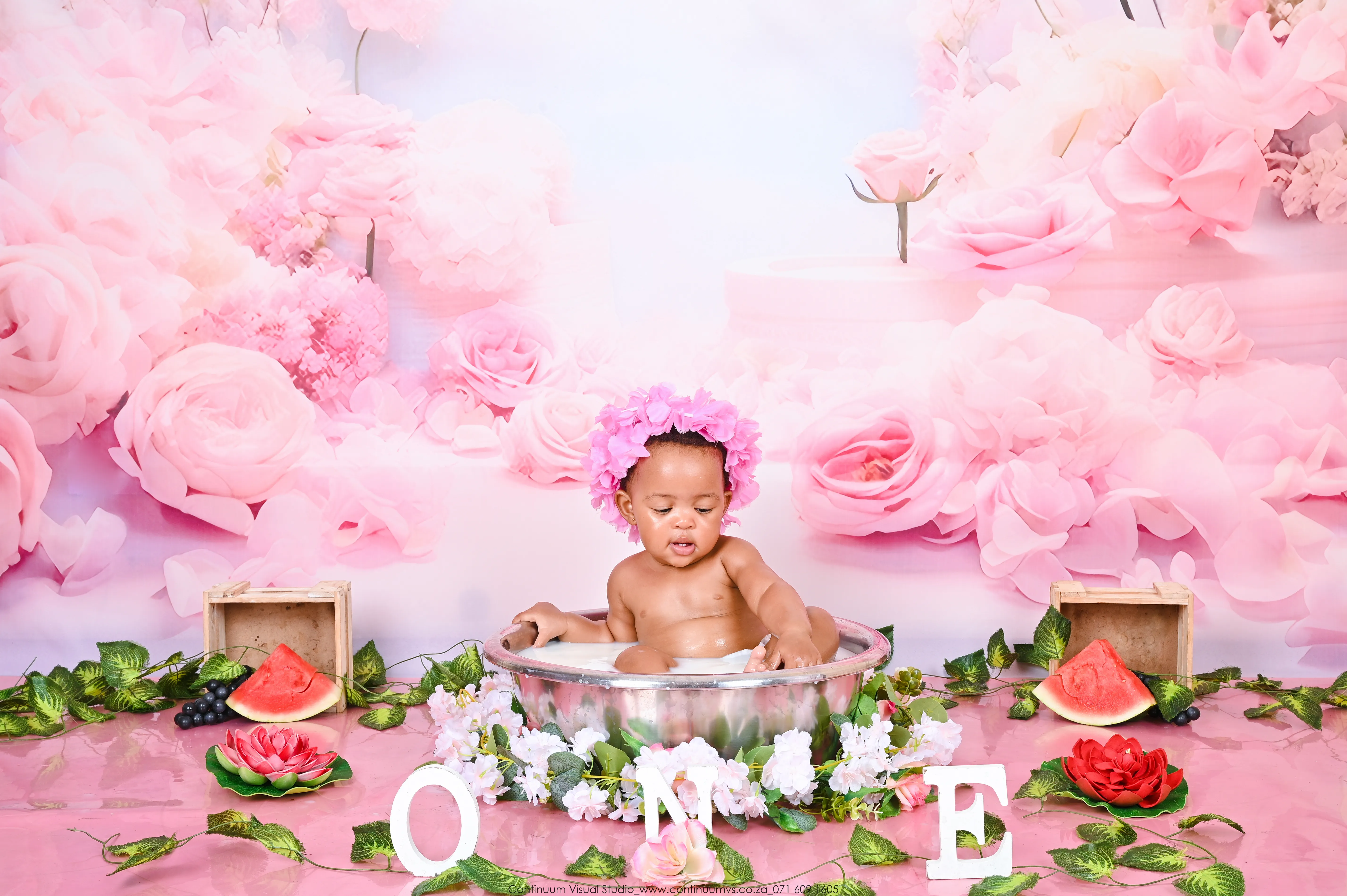 Cake smash — close up baby face with frosting